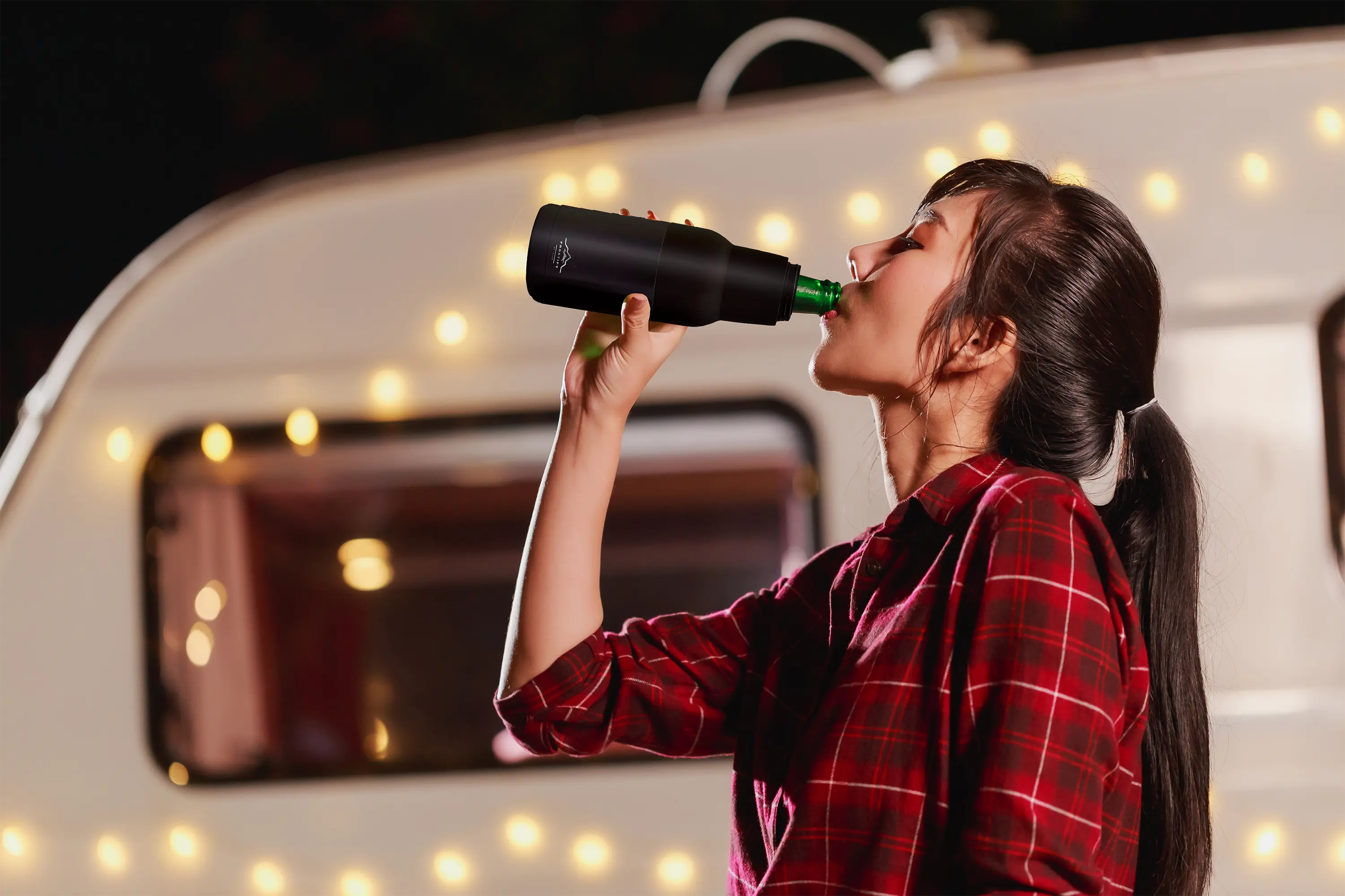 Asian woman in red dress using Frostify drink cooler - premium beverage chiller